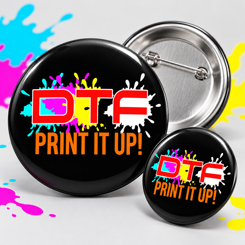 Illustrative mockup of custom 2.5-inch buttons with DTF Print It Up logo
